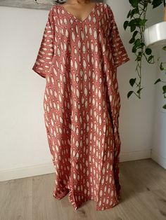 This Item is handmade. We use organic top quality cotton to ensure your skin is pampered and always natural. It is beautifully painted on with blocks- a traditional Indian style of printing.Each layered block by block,colour by colour, creating an exquisite design. The dyes used are also organic. The design is multi functional depending on your mood, Use it like a kaftan to lounge around the house in or even as a swim cover up for your day at the beach or pool. REGULAR 52 INCH CHEST PLUS SIZE 63 Oversized Cotton Dress For Beach Cover-up, Summer Oversized Cotton Maxi Dress, Oversized Cotton Summer Maxi Dress, Cotton Maxi Dress With Kimono Sleeves, Cotton Tunic Maxi Dress For Beach, Cotton Maxi Dress For Loungewear, Pink Bohemian Maxi Dress For Loungewear, Cotton Dresses With Block Print And Kimono Sleeves, Cotton Festival Dress With Kimono Sleeves