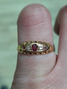 "An 18ct gold Edwardian ruby and diamond ring. The ring is not Hallmarked, but is stamped \"18CT.\" The ring contains three rubies, and two diamonds, all of which were cut by hand. A timeless design, with beautiful colour rubies. Finger size M, but we can make the ring bigger, or smaller." Wishbone Ring, Edwardian Ring, Ruby And Diamond Ring, Edwardian Jewelry, Amethyst And Diamond Ring, Signet Ring, Rings Statement, Beautiful Rings, Statement Rings