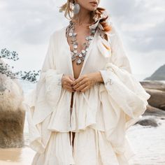 Elegant Summer Wedding Kimono, White Bohemian Kimono For Festival, White Bohemian Kimono For Beach, Bohemian Ruffled Beach Dress, Bohemian Ruffled Beach Dress For Spring, Elegant White Kimono For Festival, Bohemian White Cover-up For Festival, White Bohemian Cover-up For Festivals, Beach Season Ruffled Beach Dress Cover-up