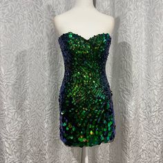 Cocktail Sequence Sherrihill Strapless Short Dress Sequins Go From Small To Big As It Goes Down This Dress Is Nwot No Signs Of Use In Excellent Condition Green Strapless Evening Dress For Party Season, Green Strapless Evening Dress For Night Out, Green Strapless Dress With Sweetheart Neckline For Night Out, Strapless Green Evening Dress For Night Out, Green Strapless Evening Dress For Cocktail, Strapless Green Evening Dress For Cocktail, Green Fitted Strapless Cocktail Dress, Green Strapless Dress For Party Season, Glamorous Green Strapless Dress For Cocktail