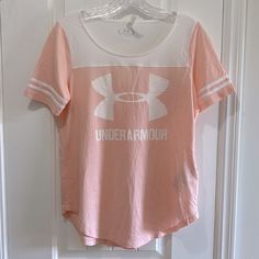 Nwt Under Armour Pink/Peachy & White Athletic Short Sleeve 3 Stripe Tee Shirt. Size Xs Under Armour Crew Neck Top With Letter Print, Under Armour Cotton Top With Graphic Print, Under Armour Sporty Tops With Letter Print, Under Armour White T-shirt With Graphic Print, White Under Armour T-shirt With Graphic Print, Sporty Under Armour Tops With Letter Print, Under Armour Cotton Tops With Letter Print, Sporty Short Sleeve Tops By Under Armour, Casual Crew Neck Top By Under Armour