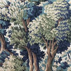 an area rug with trees and bushes in blue, green, beige and white colors