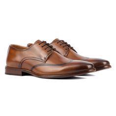 The Orton dress Oxford shoes were designed with the formal gentleman in mind. With a classic wingtip design and lace-up styling, these shoes will put the finishing touch on any outfit. Made with premium leather and carefully crafted details, you can be sure you’re making a statement without compromising on quality or performance. Classic Wingtip Derby For Semi-formal Occasions, Classic Semi-formal Derby With Wingtip, Formal Wingtip Dress Shoes, Classic Semi-formal Wingtip Derby, Formal Goodyear Welt Wingtip Derby, Classic Wingtip Lace-up Shoes For Business, Classic Semi-formal Lace-up Shoes With Goodyear Welt, Classic Wingtip Dress Shoes With Goodyear Welt, Semi-formal Wingtip Dress Shoes With Goodyear Welt