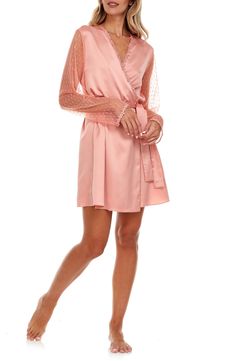 Transform the atmosphere of an evening when you slip into this satin robe traced by metallic lace and framed by utterly sheer mesh. 34" length (size Medium) Long sleeves Removable tie belt 85% nylon, 15% metallic fibers with 100% polyester contrast Hand wash, line dry Imported Elegant Robe With Lace Cuffs, Wedding Night Satin Robe With Lace Sleeves, Elegant Spring Party Robe, Feminine Satin Robe With Lace Trim, Elegant Sheer Robe For Party, Silk Evening Robe For Spring, Sheer Fitted Party Robe, Elegant Summer Lace Robe, Feminine Long Sleeve Party Robe