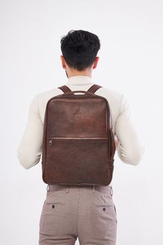 - Our product is 100% genuine leather. - It is produced in master hands with quality materials and delicate handwork. - Dimensions 43 x 33 cm Brown Travel Backpack With Smooth Grain, Travel Backpack With Smooth Grain In Brown, Brown Smooth Grain Travel Backpack, Luxury Leather Backpack With Smooth Grain, Luxury Laptop Bag With Leather Lining, Luxury Laptop Backpack With Leather Lining, Cognac Leather Backpack, Luxury Rectangular Smooth Grain Backpack, Classic Textured Faux Leather Bag