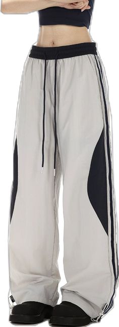 Spring Streetwear Bottoms With Contrast Color, Sporty Wide Leg Bottoms With Contrast Color, Sporty Cotton Sweatpants With Contrast Color, Sporty Spring Pants With Contrast Color, Sporty Contrast Color Pants, White Color Block Bottoms For Streetwear, Color Block Athleisure Pants For Streetwear, Athleisure Color Block Pants For Streetwear, White Athleisure Bottoms With Contrast Color