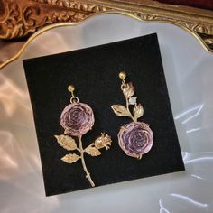 Description:Chic Pink Rose Earrings Specifications: Material: Alloy Metal, Crystal, Cubic ZirconiaColors: goldSize: 4.9 cm * 2.7 cmWeight: 6g/pcs Put a playful spin on your look with our Chic Pink Rose Earrings 💫 These earrings add a touch of fun to any outfit, making them perfect for any occasion. Made with chic pink roses, these earrings are a must-have for any fashion-forward individual. 🌹 Rose Gold Flower Earrings For Valentine's Day, Rose Gold Metal Flower Earrings For Party, Rose Gold Flower Earrings For Party, Pink Rose Design Flower Earrings For Valentine's Day, Party Flower Earrings In Rose Gold Metal, Rose Metal Jewelry For Party, Pink Rose Design Earrings For Valentine's Day, Rose Gold Flower Jewelry For Parties, Pink Flower Metal Earrings