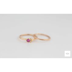 These luxurious cubic zirconia stacking rings are meticulously crafted by hand and feature a striking fuchsia cubic zirconia stone set in a gold-filled bezel. The vibrant dark pink hue of the dark pink cubic zirconia stone complements the bright gold bands, creating a regal and timeless color combination that exudes elegance and beauty. The gold filled arrow accent adds a modern twist on these timeless treasures. Whether for everyday wear or a special occasion, these gold filled stacking rings a Textured Ring Band, Color Fucsia, Royal Colors, Textured Ring, Gold Ring Stack, Bright Gold, Timeless Treasures, Stone Settings, Stacking Rings