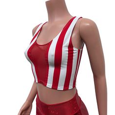 Made of our red stripe print spandex w/ red mesh inset in the front, this crop tank top fits snug to the body with plenty of stretch. Wear this to a rave, to the club, a rave, to a festival, or a night out. Also great for running, yoga, roller derby, or any activity.*We can make this top in any of our available fabrics - you can request the custom fabric choices in the personalization box if you prefer something other than what is shown in this listing. Summer Cropped Mesh Crop Top, Red Tank Top For Summer Parties, White Fitted Mesh Crop Top, Sleeveless Mesh Crop Top For Summer, Stretch Cropped Tank Top For Club, Fitted Sleeveless Mesh Crop Top, Red Summer Tank Top For Club, Summer Club Tank Crop Top, Red Tank Top For Summer Clubbing