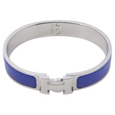 Blue metal Hermes Clic Clac bangle bracelet with Palladium hardware and H turn-lock closure.   63388MSC Modern Bracelets, Modern Jewelry, Silver Bracelets, Bangle Bracelet, Metallica, Bangle Bracelets, Jewelry Bracelets, Bangles, Bracelet