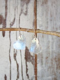 "I cut these two free form hearts from a sheet of sterling silver metal and hammered them to create these rustic earrings. They are coated to prevent tarnishing. The hearts have a slight curve to them to pick up shine from the hammered indensions. They measure 1 1/4\" in length from the top of the sterling silver earwire. Very lightweight and comfortable for all day wear. See the longer heart version here: https://www.etsy.com/listing/129416439/valentines-gift-sterling-silver-heart?ref=shop_home Silver Heart Earrings For Anniversary Gift, Silver Heart Shaped Earrings For Anniversary, Silver Heart Earrings For Anniversary, Hammered Silver Heart Jewelry, Heart-shaped Hammered Sterling Silver Jewelry, Sterling Silver Heart Earrings For Anniversary, Sterling Silver Earrings For Anniversary Gift, Silver Sterling Silver Earrings For Anniversary Gift, Sterling Silver Heart Earrings