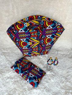 ***African tribal bag, 100% handcrafted using tribal fabric material .***fully lined,***it has a zip and extension zipper inside***It's a perfect gift for her. ***Can also be used as a office bag. **It has a matching purse and earrings.**It's 8 by 12***It is 8"length ×12inches***Perfect christmas gift for her***For wholesale kindly message us.Ship via dhl express. Colorful Handmade Shoulder Bag For Gifts, Colorful Handmade Shoulder Bag As Gift, Handmade Festival Shoulder Beach Bag, Festival Handmade Shoulder Beach Bag, Handmade Colorful Shoulder Bag Gift, Handmade Multicolor Beach Bag For Festivals, Bohemian Fabric Tote Bag, Bohemian Tote Beach Bag As Gift, Bohemian Multicolor Bags For Gifts