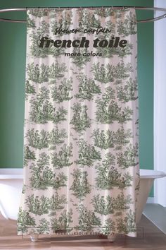 a shower curtain with an image of trees on it and the words french table printed in black