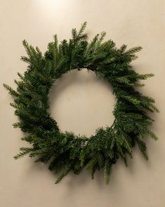 a green wreath hanging on the wall