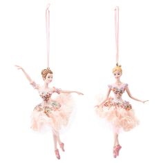 two ballerina ornaments hanging from strings with pink tutues and flowers on them