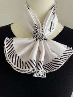 This 100% silk twill luxury square scarf with hand-rolled edges has a minimalist black and white stripes design. Could go well with any outfit.  Material: 100 % mulberry silk twill This scarf is made of 14 momme 100% mulberry silk which is heavier, softer, and more durable. Silk twill is one of the finest silk fabrics, woven with a pattern of diagonal parallel ribs for reinforced structure. Perfect gift for Valentine's Day, Mother's Day, Birthday, and Anniversary gifts. Size: 70 cm x 70 cm / 27 in x 27 in As this scarf is hand-rolled, the dimensions indicated may vary. Edges: Hand-Rolled  This essential accessory complements any outfit. Can style as a neck scarf, a head scarf, or at the waist. Suitable for all seasons, gift ideas for the holiday season, and special occasions. Care Instruct Elegant White Square Silk Scarf, Elegant Black Square Silk Scarf, Elegant White Square Scarf, Classic White Silk Scarf For Gift, Elegant Square Scarves For Formal Occasions, Elegant Square Scarf For Formal Occasions, Classic White Scarf For Gift, Classic White Silk Scarf For Formal Occasions, Elegant White Handkerchiefs As Gift