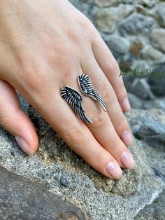 Angel wing ring Feather Ring sterling silver angel wing ring Silver Feather ring Antiqued silver ring Oxidized angel wing earrings The ring is adjustable, The two wings are not connected. However we offer sizes so that it fits perfectly Weight of the ring 9-10 gram depending on the size Feather Ring Silver, Wing Ring, Angel Wing Ring, Pomegranate Jewelry, Full Finger Rings, Healing Stones Jewelry, Silver Angel Wings, Antique Silver Rings, Angel Wing Earrings