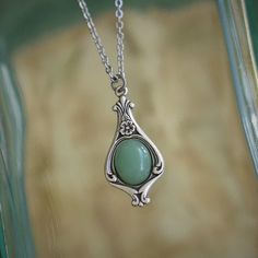 Elegant and simple antique style stone or shell pendant on an 18" antiqued brass or silver chain.  Choose the stone and the metal finish. I do not recommend wearing this jewelry while bathing or swimming. Be sure to search my shop for matching stone jewelry.For other aventurine items check out this listing: https://www.etsy.com/listing/1027169859/aventurine-stone-vintage-style-necklaces Victorian Pendant Necklace, Piercing Inspo, Blue Stone Necklace, Vintage Style Necklace, Victorian Pendants, Aventurine Stone, Antique Necklace, Earrings Rings, Shell Pendant