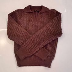 Brown Collared Cable-Knit Sweater. Never Worn. Size Small. Casual Brown Knit Polo Sweater, Brown Cotton Cable Knit Sweater, Brown Cable Knit Cotton Sweater, Brown Wool Knitted Tops, Wool Knitted V-neck Top, Casual Textured Knit Fitted V-neck Sweater, Casual Fitted Textured Knit V-neck Sweater, V-neck Wool Knitted Tops, Fitted Casual V-neck Sweater With Textured Knit