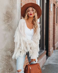 Oversized Fringe Sweater For Fall, One Size Fringe Sweater For Fall, Beige Fringe Cardigan For Fall, Fall Beige Fringe Cardigan, Beige Long Sleeve Sweater With Fringe, Fringe Knit Outerwear With Long Sleeves, Long Sleeve Knit Outerwear With Fringe, Knit Long Sleeve Outerwear With Fringe, One Size Fringe Cardigan For Fall