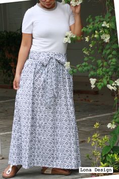 This comfy black white maxi skirt by Lona Design is perfect for spring  summer days, even winter (wear it with boots and legging). The duotone cotton skirt has 2 side pockets and shirred waist for easy fit. The handmade skirt comes with a lovely detachable belt. White Relaxed Bohemian Maxi Skirt, White Relaxed Maxi Skirt, Long Relaxed Skirt With Tie Waist, Relaxed Tiered Skirt With Tie Waist, Long Skirt With Tie Waist, White Maxi Dress With Relaxed Fit, White Gathered Maxi Skirt, Flowy Tie Waist Tiered Skirt, Flowy Tiered Skirt With Tie Waist