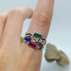 Colorful Baget Ring🌾 This ring is so elegant and perfect companion for other rings. You can mix the colors or just wear it alone for the perfect finishing.  Details:  ◇ Very elegant and simple  ◇ Useable as stapel ring  ◇ Nickel free  ◇ Hypoallergenic  All our pieces are 925 sterling silver and 14k gold plated. Follow us on instagram for more @dohmanstone  With love and magic, Dohmanstone Rose Gold Sterling Silver Stackable Solitaire Rings, Rose Gold Sterling Silver Stackable Rings, Stackable Emerald Cut Sterling Silver Rings, Rose Gold Sterling Silver Crystal Ring For Promise, Stackable Rose Gold Diamond Ring In Sterling Silver, Silver Emerald Cut Stackable Rings Fine Jewelry, Rose Gold Sterling Silver Birthstone Promise Ring, Emerald Cut Stackable Silver Diamond Ring, Stackable Emerald Cut White Gold Rings