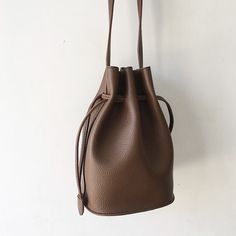 2021 New style.  Simple modern women's leather top handle bag. Material:  Soft PU Leather / Wooden Handle Size:  27cm wide x 17cm tall  (10.6in x 6.7in) Designer Style ID:  8186 Top Handle Soft Leather Bag, Small Size, Women's Everyday Handbag Everyday Shoulder Bag, Everyday Handbag, Soft Leather Bag, Chic Leather, Leather Bucket Bag, Leather Bucket, Designer Style, Wooden Handles, Leather Top