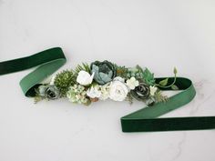 Absolutely gorgeous flower belt from our new collection. Thanks to the use of artificial flowers and leaves, the belt is durable. Our lovely belt will be a keepsake for many years to come. This sash is more beautiful than the pictures. It is a special touch to your bohemian look! Length: about 79 inches (200 centimeters) Width: 0.98 inches (2.5 centimeters) The price is for 1 piece of of the belt. Take a look at our other accessories ---> https://www.etsy.com/shop/LolaWhiteShop Thank you for vis Belt For Gown, Baby Shower Belt, Green Sash, Dark Green Wedding, Belt For Dress, Floral Belt, Green Wedding Dresses, Bridesmaid Sash, Flower Belt