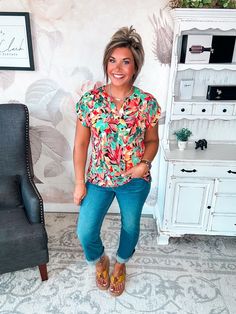 Some tops make a subtle statement. This isn’t one of them. Its notched V-neck and short sleeves keep things chic. Pair this top with your favorite distressed denim for a laid-back boho vibe or a structured blazer for a splash of color in the office. However you style it, one thing’s for sure: in this scene-stealing top, you’ll be the center of attention. After all, when you’ve got a silhouette this flattering, the only option is to make a memorable impression. Figure it out? This top already has Trendy V-neck Short Sleeve Top For Day Out, Casual Short Sleeve Top With Floral Print, Casual Summer Short Sleeve Top, Trendy Short Sleeve Top For Summer Casual Gatherings, Trendy Short Sleeve Top For Casual Gatherings, Bohemian Tops For Casual Gatherings, Short Sleeve Blouse For Vacation In Fall, Short Sleeve Blouse For Fall Vacation, Vacation Blouse For Fall With Short Sleeves