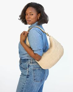 The one and only Zip-top crescent bag With generous capacity Fits an iPad, water bottle, sunnies, with One interior pocket for added organization and Two ways to carry - 36.5" crossbody strap & wider 21" shoulder strap Made of handwoven leather Modern Natural Hobo Bag For Everyday Use, Modern Bucket Bag With Intrecciato Weave For Everyday, Modern Hobo Bag With Braided Handles For Everyday, Everyday Woven Leather Shoulder Bag, Natural Hobo Bag With Detachable Strap For Everyday Use, Modern Natural Hobo Bag For Travel, Versatile Natural Color Hobo Bag For Everyday Use, Versatile Shoulder Bag With Intrecciato Weave For Travel, Everyday Intrecciato Crossbody Bucket Bag