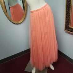 Tulle Maxi Skirt With Satin Lining In Salmon Pink By Jenny Yoo Collection Originally Available At Anthropologie. Tagged Size 4. Excellent Used Condition. We Find No Flaws Or Damage. See Photos For Details. Please Comment Below With Any Questions. *Many Of Our Items Come From Estate Sales Or Other Sources, Which Means We Do Not Know Their History. We Do Not Automatically Launder Or Clean Items That Are Vintage Because We Do Not Want To Damage Them. We Also Do Not Launder Or Clean Items That Are " Vintage Skirted Bottoms For Party, Vintage Skirted Party Skirt, Spring Vintage Tulle Petticoat, Vintage Spring Tulle Petticoat, Vintage Tulle Petticoat For Spring, Spring Evening Flowy Petticoat, Spring Evening Petticoat Skirt, Spring Wedding Full Length Skirt, Vintage Tulle Skirt For Spring