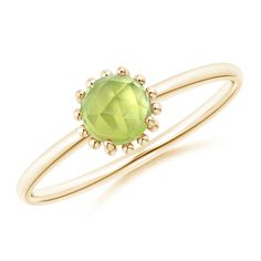 The faceted cabochon peridot looks charming on the sleek 14k yellow gold shank. Intricate bead work forms a striking halo around the olive green gemstone, adding to the overall beauty of this prong set peridot ring. 16th Wedding Anniversary, Peridot Ring, Green Gemstones, 18k Rose Gold, Prong Setting, Bead Work, Olive Green, Gemstone Jewelry, Heart Ring