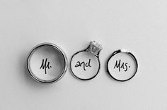 three rings with names on them and the words mr and mrs written in cursive writing