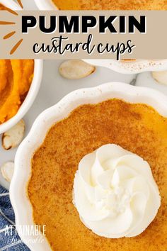 pumpkin custard cups with whipped cream in the middle and on top, surrounded by other desserts