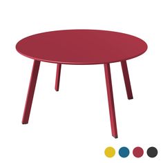 a red table with four different colored circles around the top and bottom, all in various colors