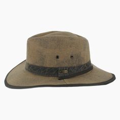 'The Buckthorn is well suited to the adventurous soul who craves a rugged hat for outdoor exploring. Made of waxed cotton that repels moisture, the Buckthorn is an outback safari style that features a vented modified teardrop crown for air flow. Trimmed with a faux leather hat band and matching brim edging, this sturdy hat will stay in place with its adjustable chin strap. Lightweight and pliable, the wide brim offer a hidden wire along the edge that can be hand shaped to meet your needs. *Exclu Rugged Brown Hat For Travel, Rugged Brown Travel Hat, Brown Rugged Outdoor Hat, Rugged Outdoor Hat With Curved Brim, Rugged Hats For Outdoor, Vintage Outdoor Hat For Fall, Waterproof Brown Hats For Outdoor Activities, Rustic Outdoor Hats For Fall, Vintage Hats For Outdoor Fall Use