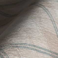 a close up view of a checkered fabric with some green lines on the side