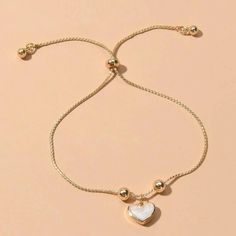 Heart Charm Bracelet Yellow Gold Yellow Adjustable Jewelry For Valentine's Day, Casual Everyday Jewelry With Heart Charm, Casual Valentine's Day Jewelry Bracelet, Casual Heart Charm Bracelet For Valentine's Day, Casual Heart Charm Bracelet, Casual Gold Friendship Bracelet, Casual Heart-shaped Jewelry, Casual Gold Heart-shaped Jewelry, Casual Heart-shaped Friendship Jewelry