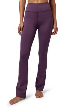 Cut from the brand's smooth, soft and lightly compressive knit, these pants have a body-hugging fit and a feel that'll have you strutting like a supermodel. 29 1/2" inseam; 17" leg opening; 11" front rise; 12" back rise (size Medium)     Pull-on style     Hidden back cell phone pocket     Moisture-wicking fabric engineered for dryness and comfort     Antimicrobial fabric engineered to inhibit the growth of odor-causing germs     71% recycled polyester, 29% elastane     Machine wash, tumble dry Seamless Fitted Mid-rise Bottoms, Solid Compressive Mid-rise Pants, Versatile High-stretch Smoothing Bottoms, Solid Stretch Yoga Pants, Sporty Yoga Bottoms With Smoothing Feature, High Stretch Elastane Workout Pants, High Stretch Smoothing Versatile Bottoms, Sporty Fitted Bottoms With Soft Touch, Compressive Elastane Pants