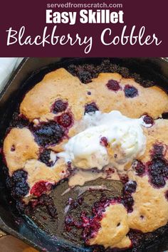 a skillet with blueberry cobbler in it and the title overlay reads easy skillet blackberry cobbler