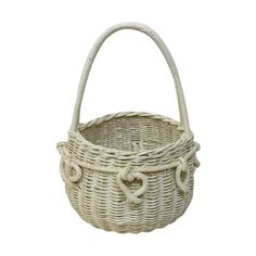 a white wicker basket with handles on a white background, isolated for use as a decoration