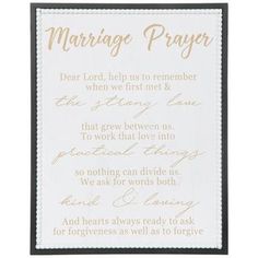 a wedding prayer card with gold lettering