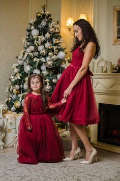 Red Formal Dress, Mother Daughter Matching Dress, Mommy and Me Outfit Mother daughter matching tutu dresses in burgundy and many other colors is perfect look for family photo shoot and any special occassion. Mommy and Me cocktail strapless dresses with soft tulle full tutu skirt and bow on backside. Dress can be tailored in different colors - black, white, green, pink, lavanda, purple, red etc., just contact me with your request. Length of the dress can be made as you wish. To make an order plea Holiday Tulle Fitted Dress, Fitted Tulle Dress For Holidays, Fitted Tulle Holiday Dress, Red Tulle Bridesmaid Dress, Red Tutu Dress For Christmas Birthday, Red Tutu Dress For Birthday And Christmas, Red Tulle Holiday Dress For Wedding, Festive Red Tulle Holiday Dress, Red Tulle Dress For Holiday