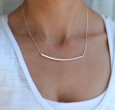 "Minimalist statement necklace - this necklace features an extra long, curved tube / bar made from high quality sterling silver sourced locally in Oregon. The bar is hollow and floats on the delicate snake chain - the snake chain is super durable and is perfect everyday wear. This necklace is the perfect gift and would be beautiful for bridesmaids in a casual wedding. ►Bar measures 69x3mm ►Model is wearing a 20 inch chain (add two - three inches to your desired length) ►The smaller curved bar de Pearl Necklace Choker, Curved Bar Necklace, Tube Necklace, Floating Necklace, Curved Bar, Silver Bar Necklace, Silver Bar, Initial Jewelry, Necklace Long