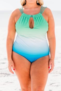 Be as pretty as a mermaid! This swimsuit is calling your name! This chic swimsuit has an ombre color you can wear with your favorite cover-ups and sandals! It's comfortable for all-day wear, has a figure-flattering one-piece design, and features the cutest keyhole halter top! Wear this swimsuit all season long! 82% Polyamide, 18% Elastane Turquoise Sleeveless Tankini For Beach, Mermaid Swimwear For Summer Beach, Turquoise One-piece Swimwear For Beach Season, Ombre Swimwear For Pool And Beach Season, Mermaid Swimwear For Summer Vacation, Mermaid Swimwear For Beach, Blue Mermaid Swimwear For The Beach, Blue Mermaid Swimwear For Beach, Ombre Swimwear For Pool