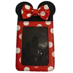 It's a world of style when you keep your essential cards safely stowed in this Disney themed card holder with card slots, an ID window. and a secure fold-over tab. * Simulated leather card holder * ID window slot * Three card slots on opposite side * Fold-over tab with metal snap closure * Polyurethane * 5'' H x 4'' W x 1'' D * Imported ** Authentic Disney Parks merchandise. ** Leather Card Holder, Card Holder Leather, Disney Parks, Snap Closure, Card Slots, Slots, Minnie Mouse, Card Holder, Disney