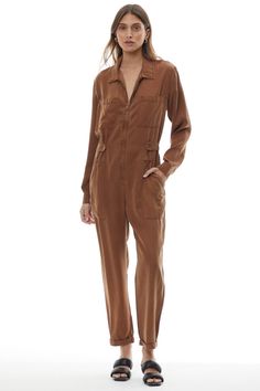 Elevate your cool girl style in our 'Harmony' Jumpsuit, made in soft tencel fabrication for on the street easy wear.| Zip up jumpsuit| Button tab waist detail | Flap chest pockets | Hip slash side pockets | Rolled hem | Available in seasonal colors | 100% Tencel | Gentle machine wash Born on the streets of LA ♡ Zip Up Jumpsuit, Cool Girl Style, Just Style, Rolled Hem, Girl Style, Season Colors, Easy Wear, The Streets, Cool Girl