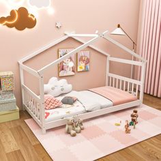 a child's bedroom with pink walls and white furniture, including a doll house bed