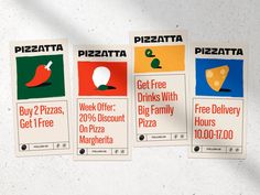 three pizza coupons are shown on a wall