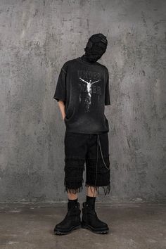 Delve into a realm where the antiquity of gothic charm blends flawlessly with the essence of wear and tear in the Distressed Jesus T-Shirt. The front is emblazoned with powerful graphics that interweave the brand's logo, creating an impactful visual narrative. The entire piece has undergone a water-washing process, resulting in a mottled, authentically aged look that speaks volumes of its vintage soul. The collar, cuffs, and hem boast a deliberately worn finish, adding to the shirt's overall all Distressed Black T-shirt For Alternative Fashion, Black Distressed T-shirt For Alternative Fashion, Alternative Washed Black T-shirt For Streetwear, Alternative Style Washed Black T-shirt For Streetwear, Gothic Distressed Tops For Streetwear, Distressed Punk T-shirt In Washed Black, Washed Black Distressed Punk T-shirt, Punk Washed T-shirt For Streetwear, Acid Wash Crew Neck T-shirt For Alternative Fashion